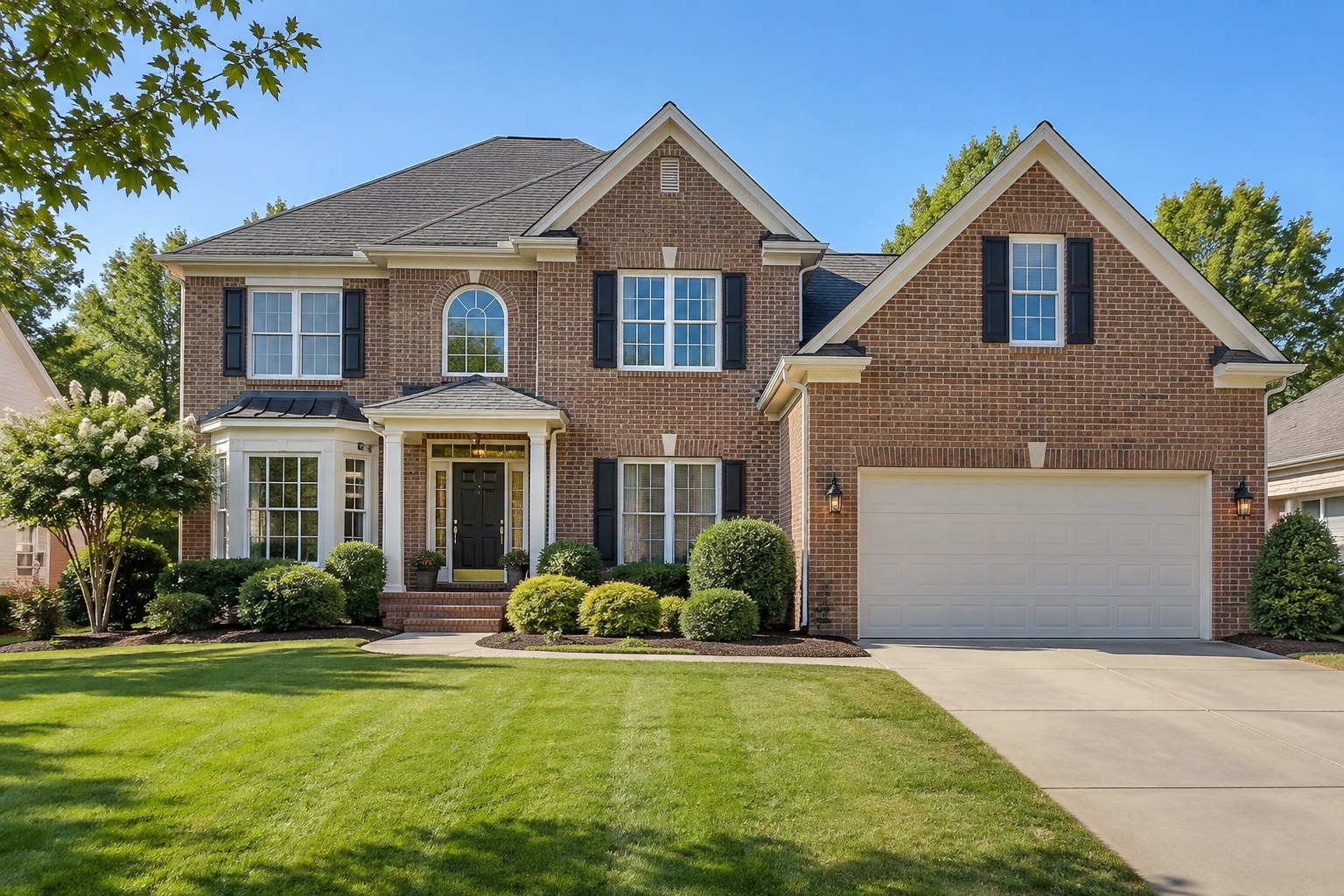A Charlotte area brick home exterior with a manicured lawn, illustrative